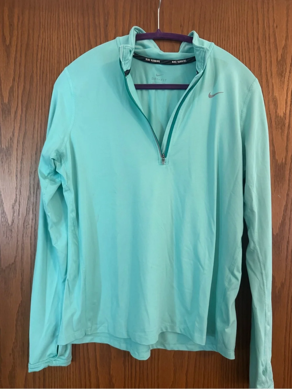 Nike women’s basketball Light Teal Dri-FIT Quarter-Zip Pullover